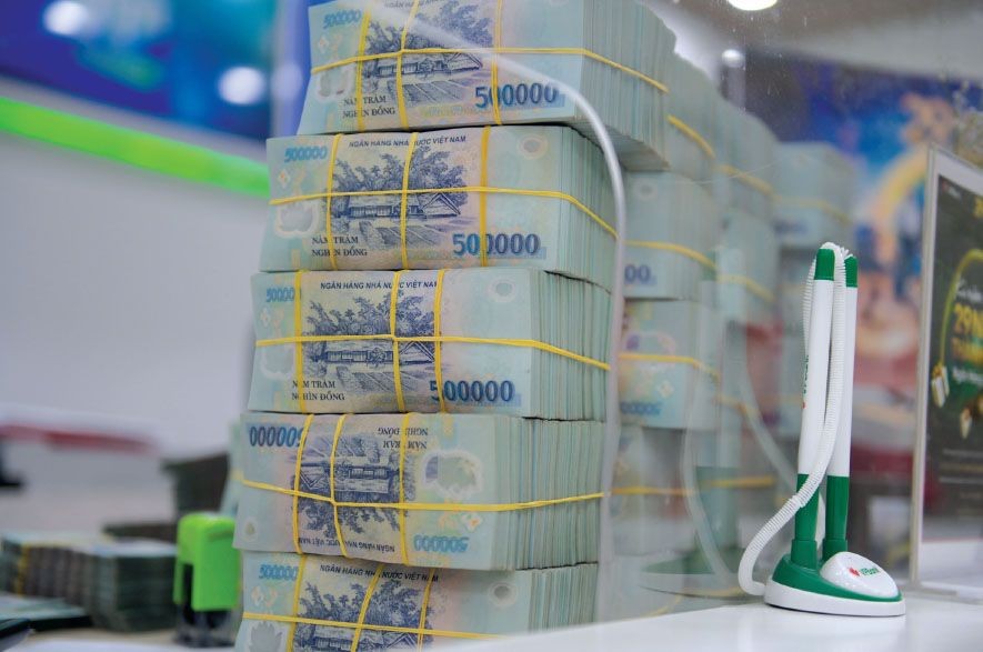 Các ngân hàng nhận chuyển giao bắt buộc gồm Vietcombank, HDBank, VPBank và MB tiếp tục hưởng lợi từ TTTD cao và không bị hạn chế đối với các hoạt động cho vay bất động sản (BĐS). (Ảnh minh hoạ)