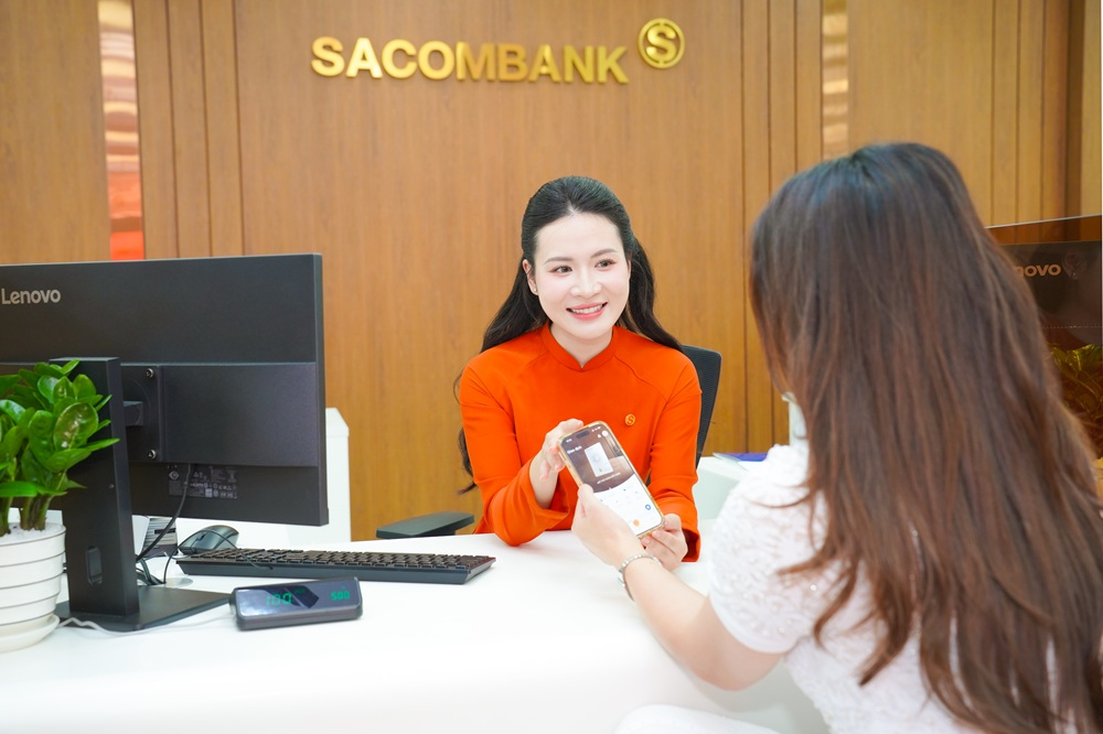 SACOMBANK mở rộng tín dụng, giảm lãi suất hỗ trợ khách hàng vay vốn. (Ảnh minh hoạ)