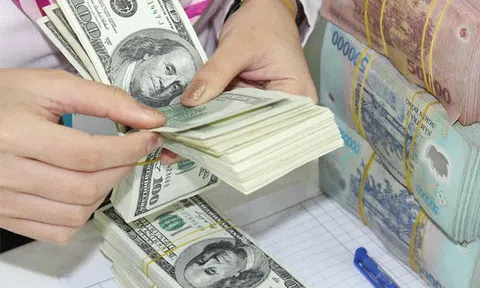 Sáng 23/2, giữ vững tỷ giá trung tâm