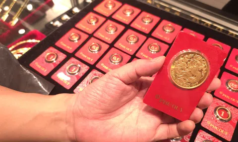 Giá vàng trước cơ hội tăng trở lại mốc 5.000 USD/ounce